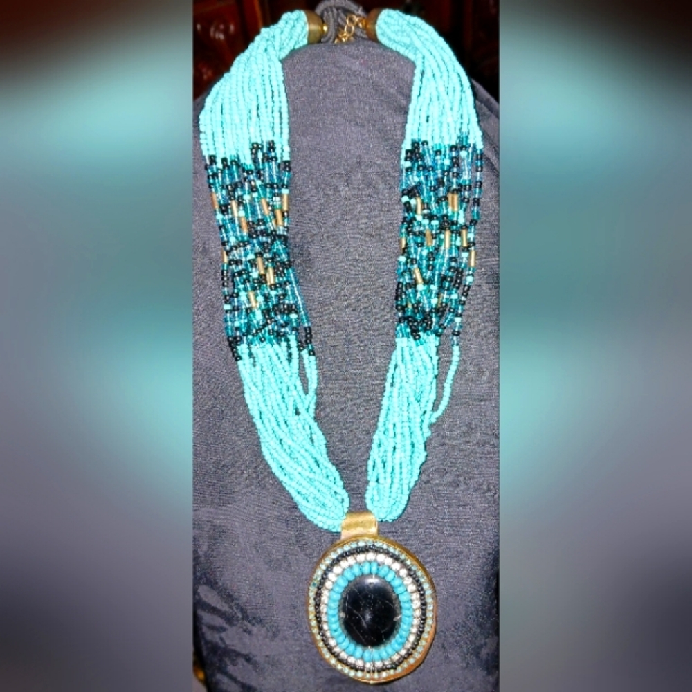 Terquoise, dark blue & copper color multi strand necklace with large medallion